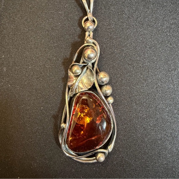 Jewelry - Elegant Silver and Amber Pendant Necklace